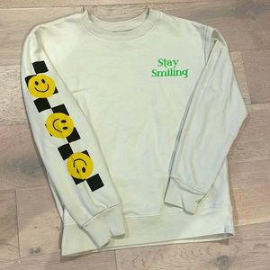 Cream smiley face crew neck